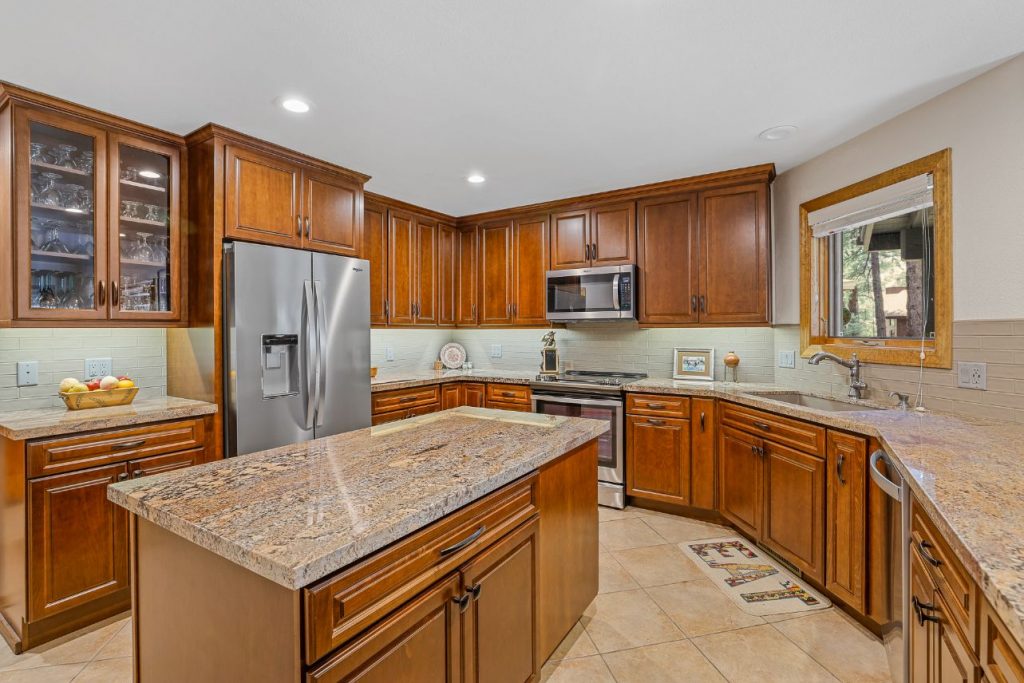 Traditional Style Kitchen Cabinetry with golden brown finish