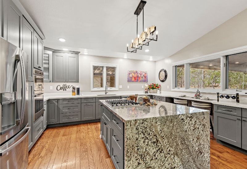 picture of kitchen with unique granite kitchen island