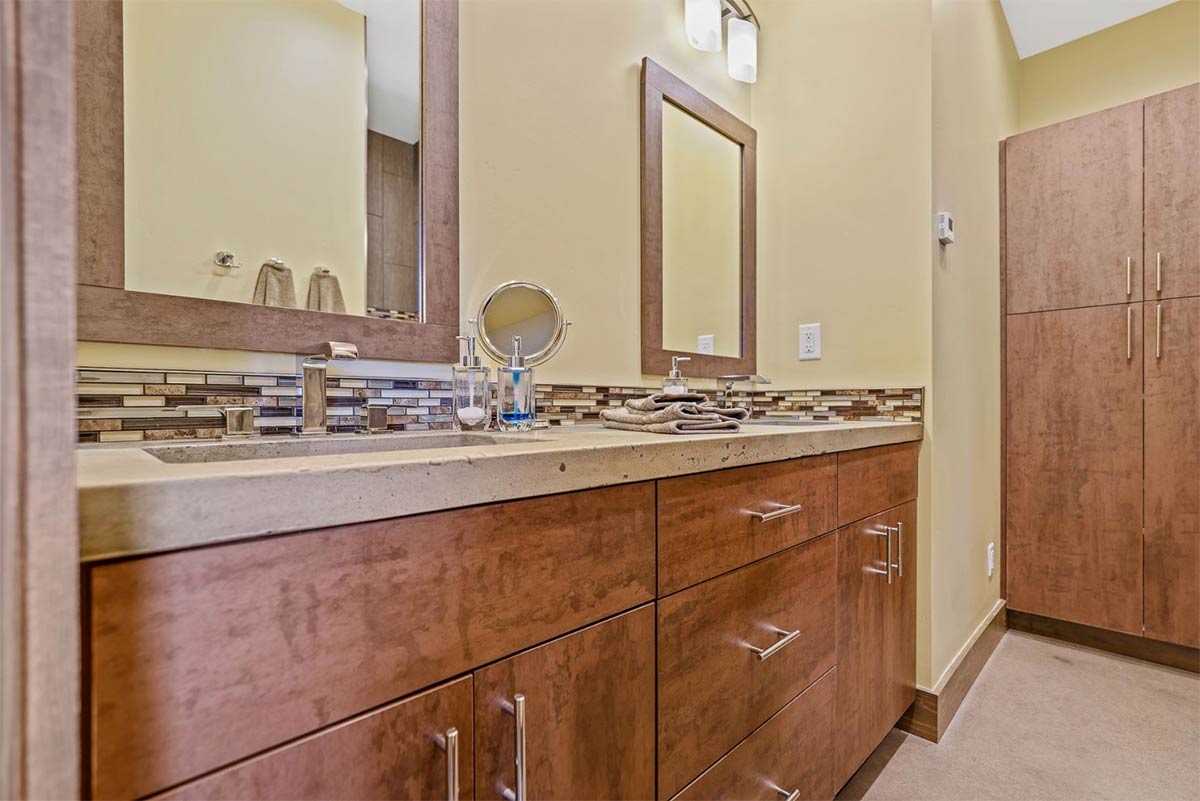Modern Bathroom featuring warm colors and metallic trim. 