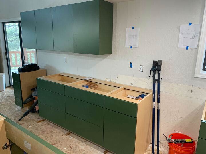 New Green Custom Cabinets Being Installed
