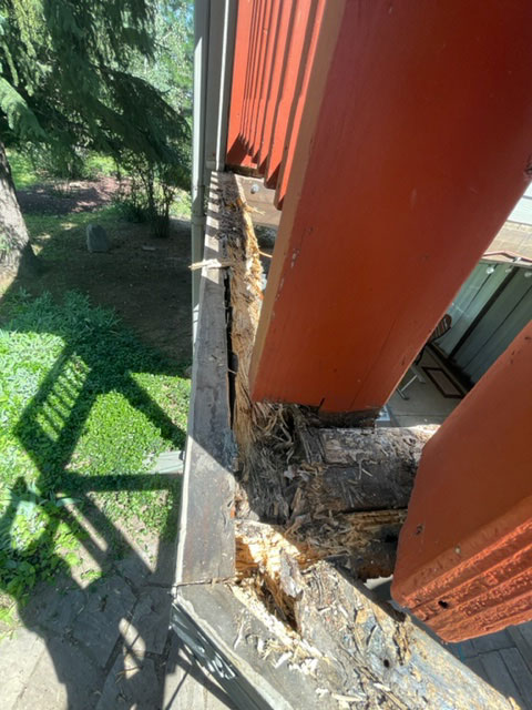 Porch with rotting wood in need of repair