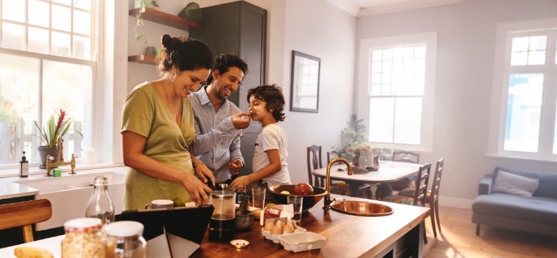 family cooking together in their kitchen