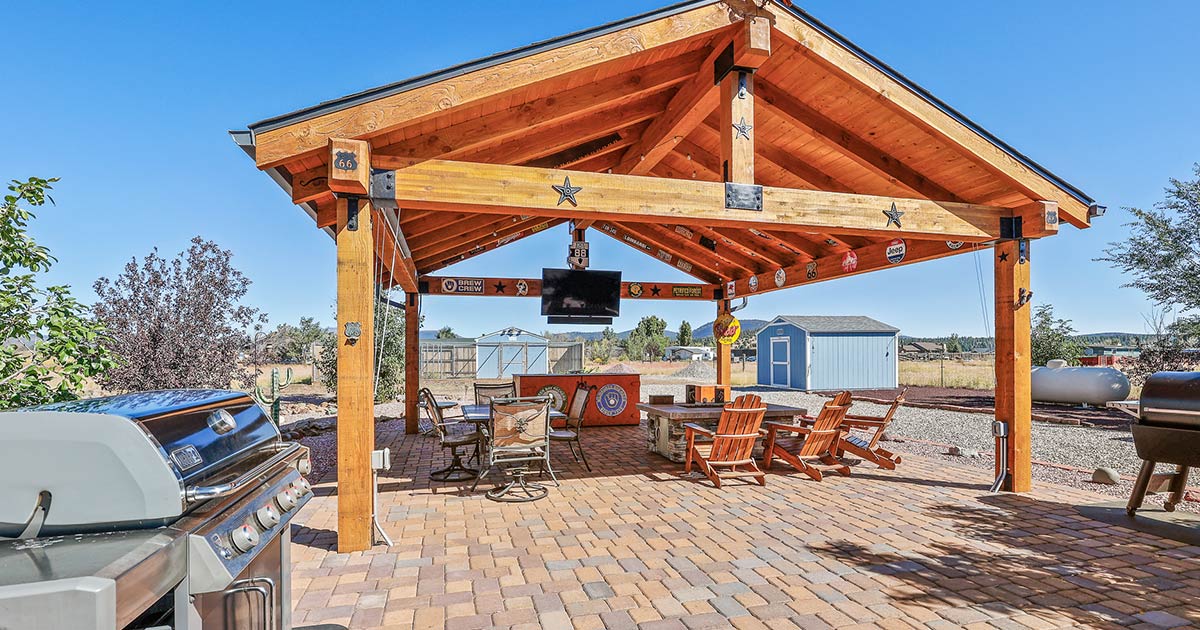 Backyard in Flagstaff with patio seating and cooking equipment